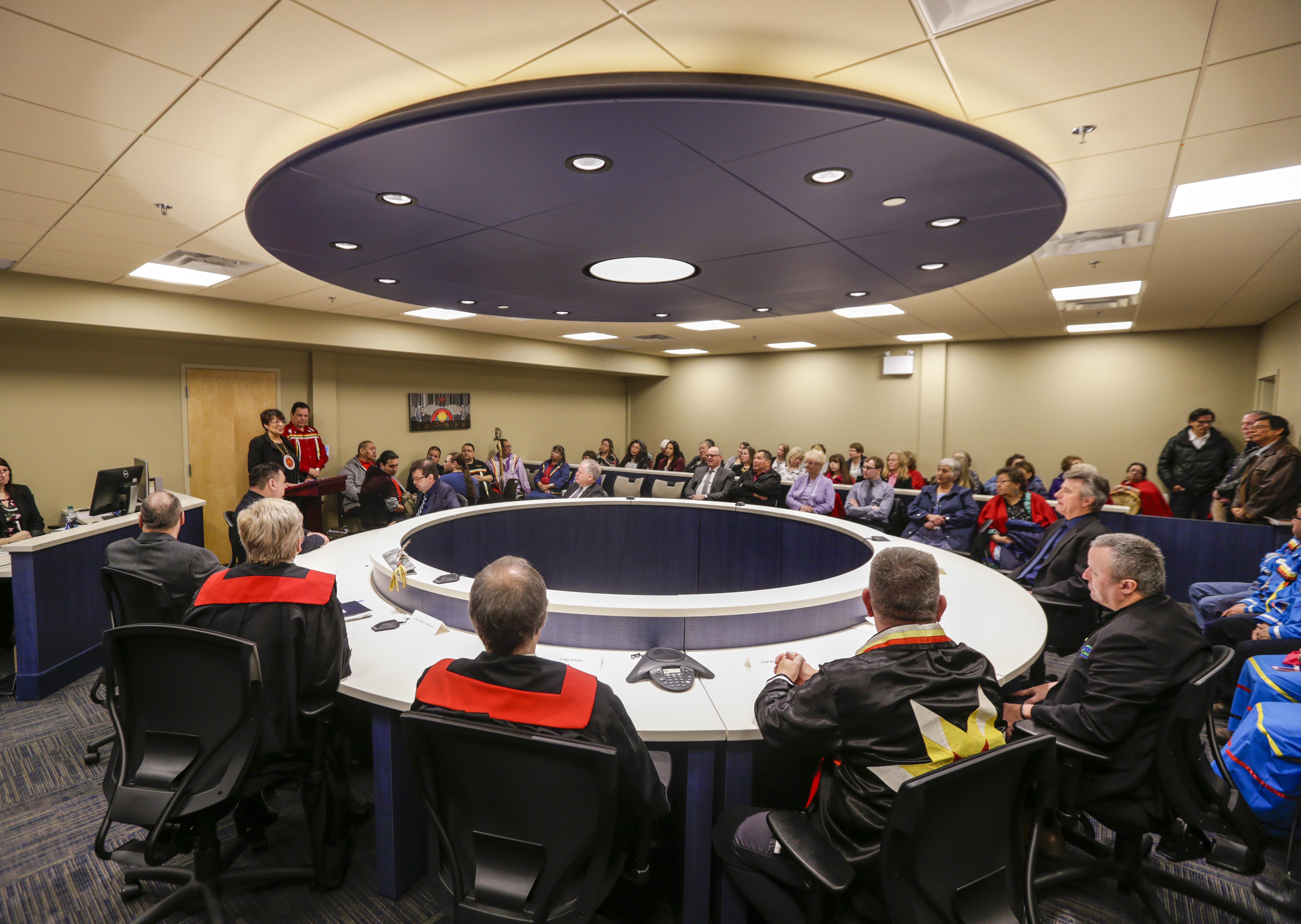 Members of the court team and First Nations leaders gather in the new courtroom in Wagmatcook on the first day of operations in 2018. 