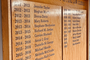 Wood plaque with the names of law clerks at the Court of Appeal. 